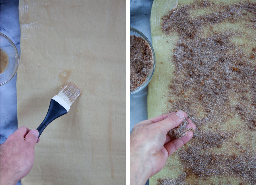 Left image is a hand brushing the melted butter and vanilla over the dough. Right image is a hand sprinkling the cinnamon filling over the dough.