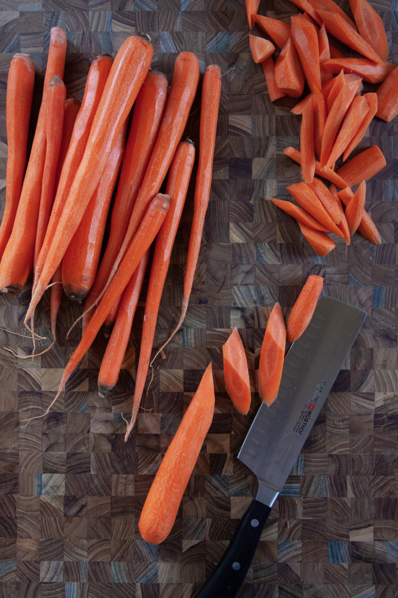 Chopped carrots on a cutting board.