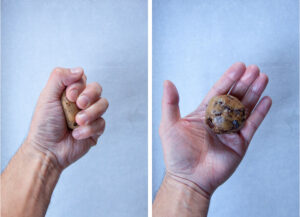 Left image is a hand squeezing cookie dough in a fist. Right image is the cookie dough ball in the palm of a hand.