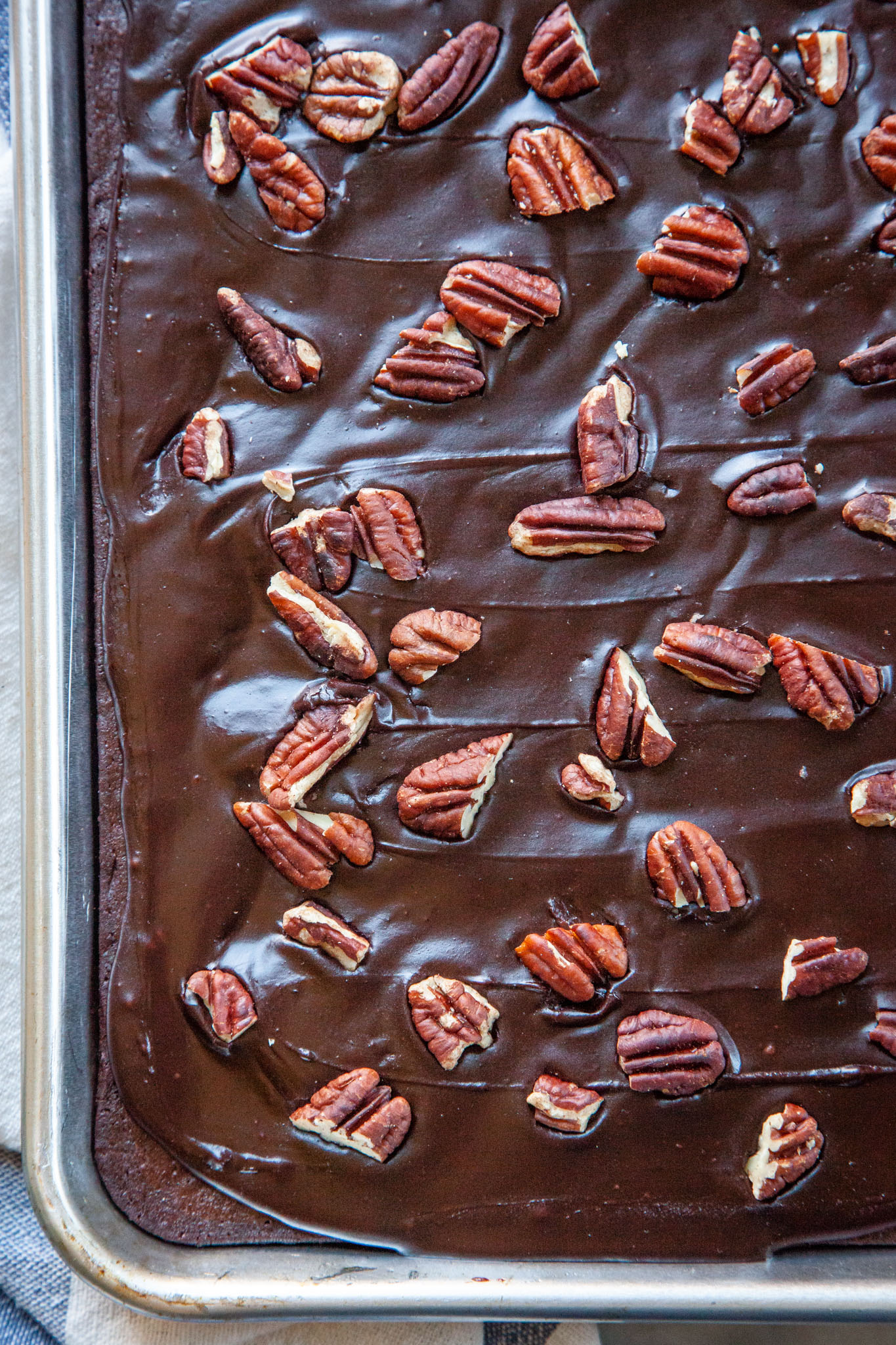 A close up of a Texas Sheet Cake still in the half sheet pan. 