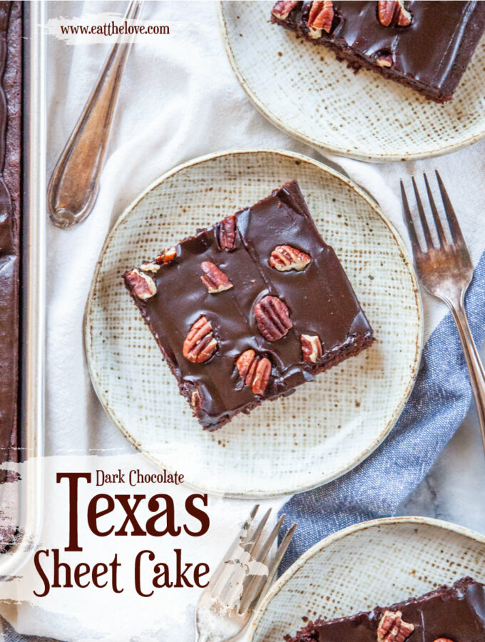 Three pieces of Texas Sheet Cake on small plates sitting on a cloth napkin, with the remaining Texas sheet cake next to it.