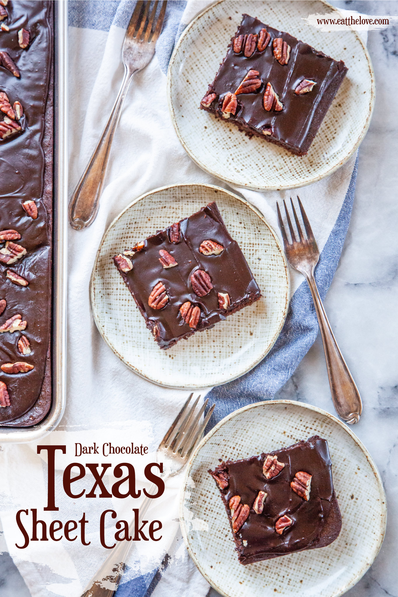 Three pieces of Texas Sheet Cake on small plates sitting on a cloth napkin, with the remaining Texas sheet cake next to it.