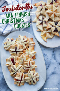 An oval plate of Finnish Christmas cookies, called Joulutorttu, with another plate of cookies next to it. The text says Joulutorttu AKA Finnish Christmas Cookies.