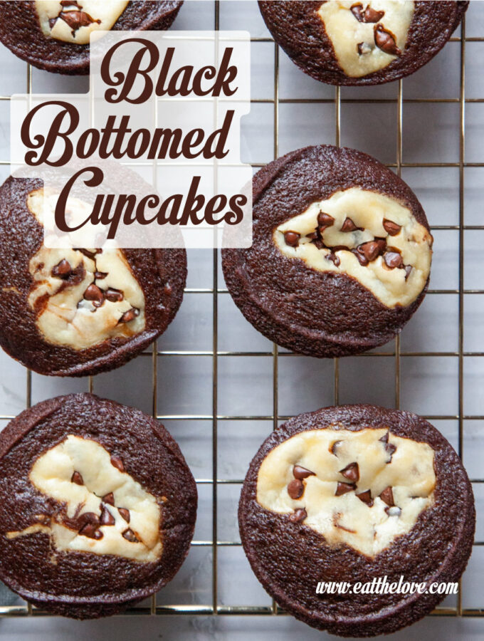 Black bottomed cupcakes on a wire cooling rack.