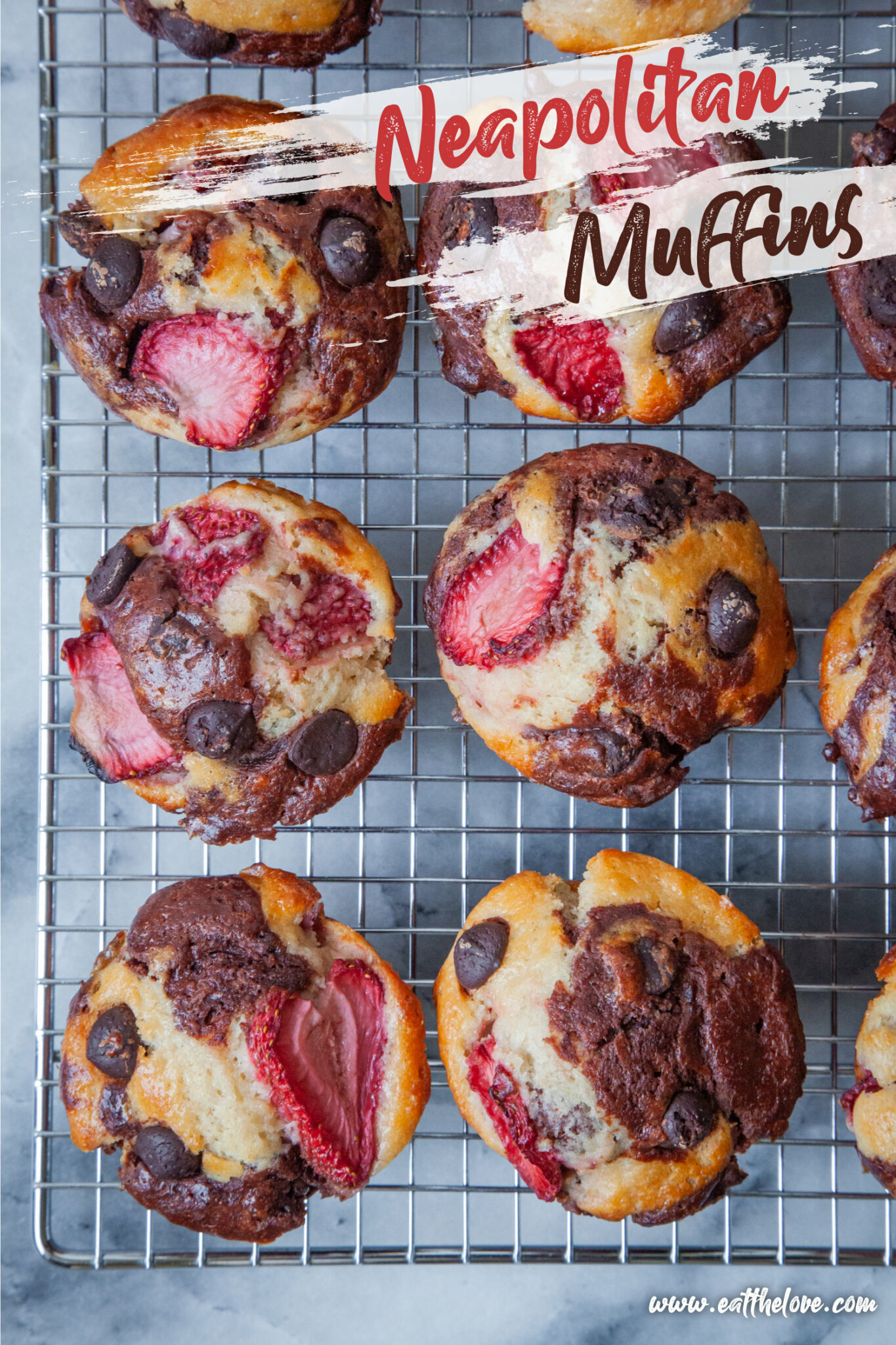 Neapolitan Muffins, vanilla, chocolate, and strawberry muffins sitting on a wire cooling rack. The text on the image says "Neapolitan muffins" on it.