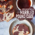 A slice of marbled pound cake on a plate, with the rest of the cake on a cutting board next to it along with a mug of tea.