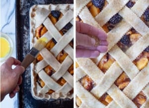 Left image is a hand brushing on an egg wash on top of the peach and blackberry slab pie. Right image is a hand sprinkling turbinado sugar over the top of the pie.